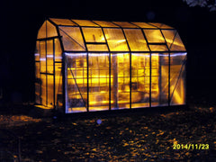 Grandio Elite greenhouse illuminated at night